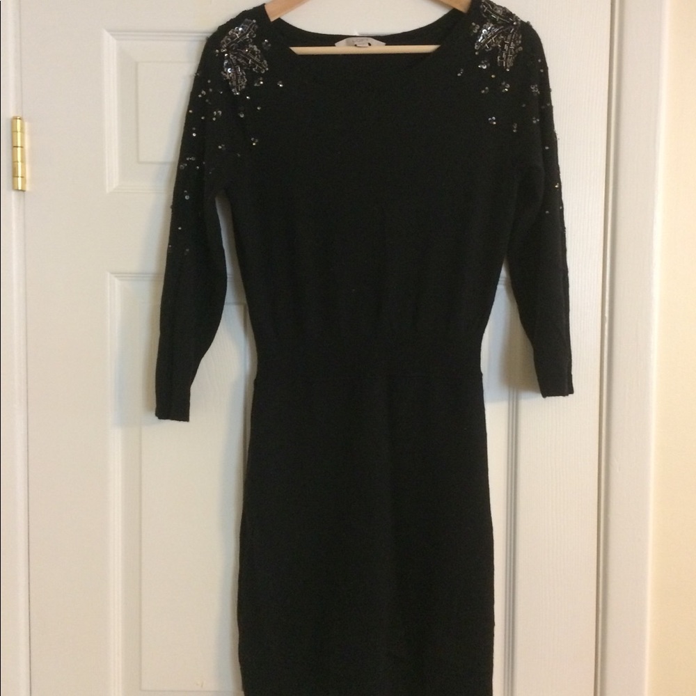 Beautiful fitted sweater dress with sequin detail